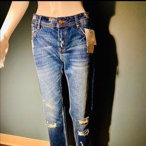 Heavy Distress on blue jeans